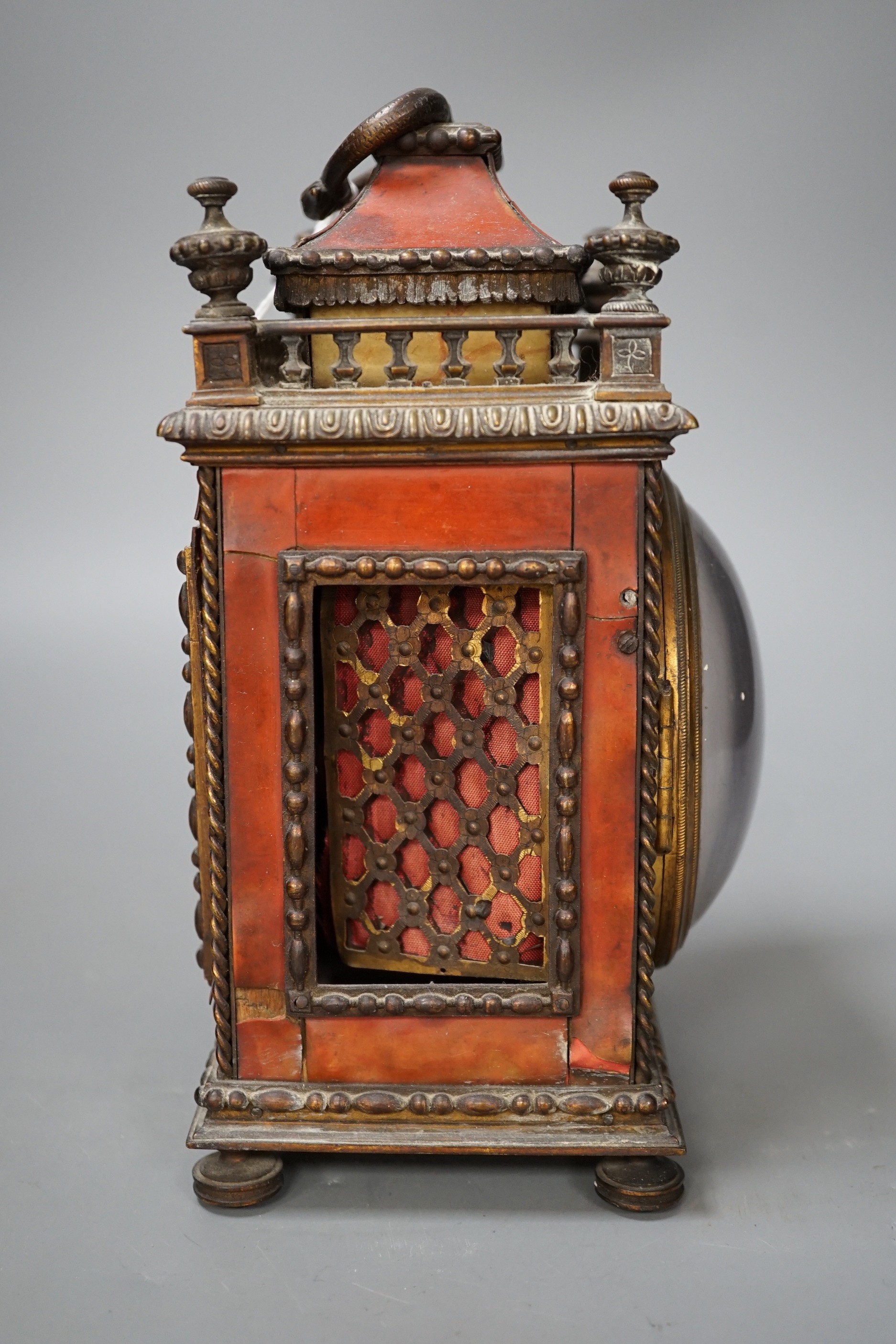 A 19th century French tortoiseshell mantel clock. 24cm high